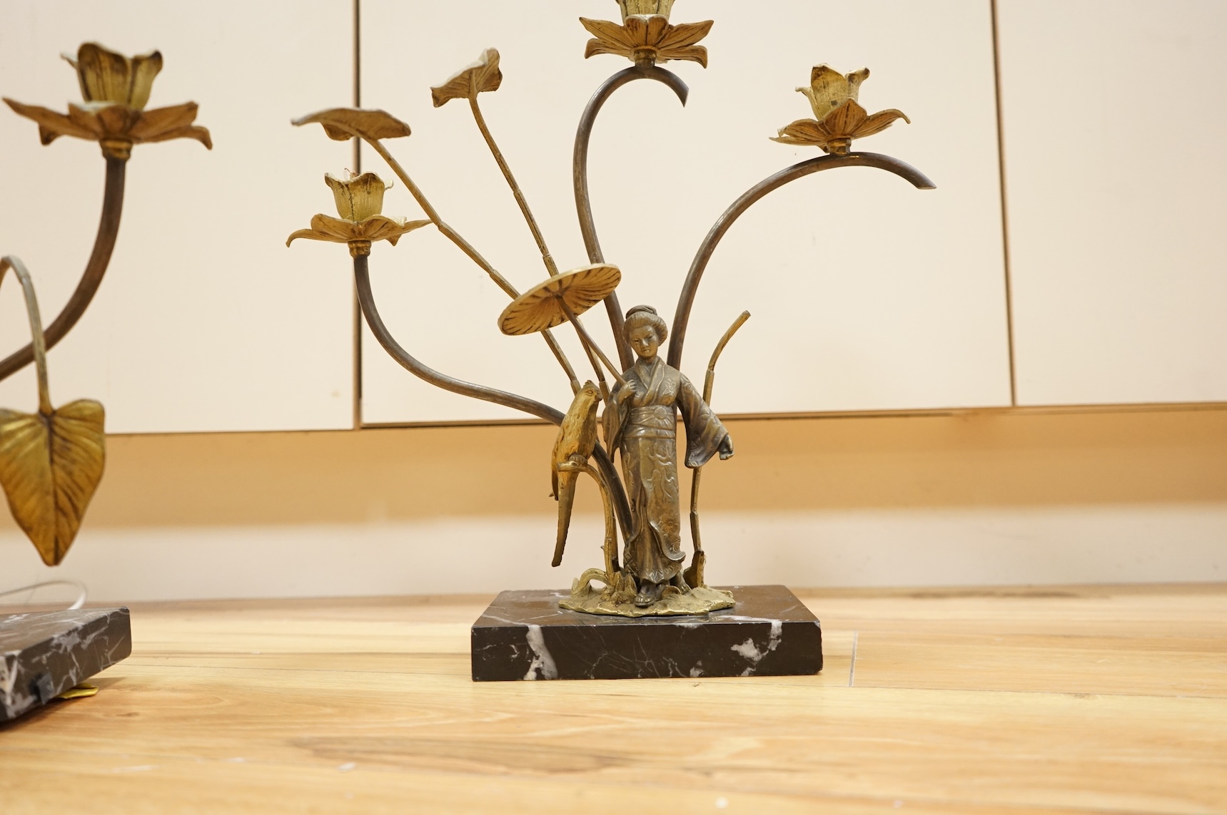 A pair of gilt metal and marble figural converted lamps, 38cm